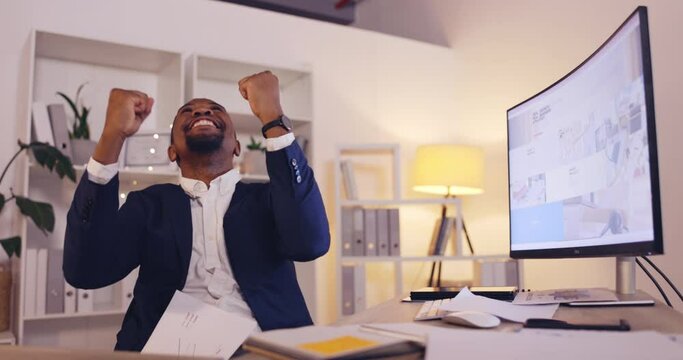 Happy man throw papers in office success, winning or business celebration news, goals or bonus wow on computer at night. Winner or african person with fist pump, documents and celebrate opportunity