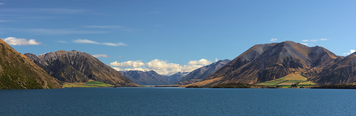 panoramic view of a lake and the mountains