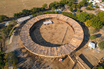 Aerial view of Wooden Structure, Knotted, traditional building process for the "bullring La Petatera" festival on Villa de Alvarez, intangible cultural heritage