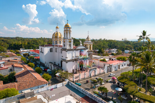 Aerial view of beautiful church in the magical town of Comala in Colima, Mexico, white town, wide angle photo.