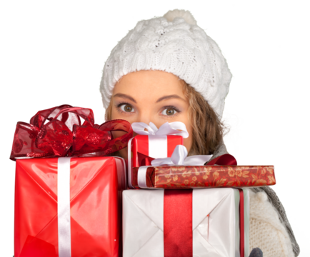 Young Woman In Winter Clothes Peeking From Behind Presents Close-up - Isolated