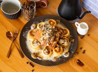 Chicken Waffle with Mushroom Milk with coffee beans, fork, spoon served in dish isolated on wooden table top view of taiwan food