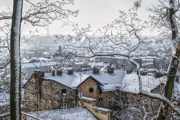 central L'viv from Castle Hill in winter with snow