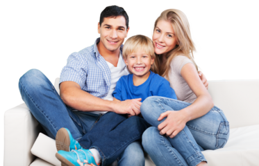 Smiling family sitting at sofa isolated on white background