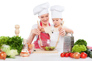 Mother and Daughter Having Fun in Kitchen Isolated