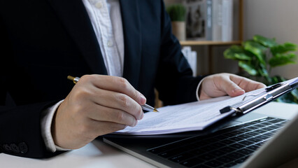 Evaluation concept, Businessman signing evaluat to agree document paperwork for job interview on...