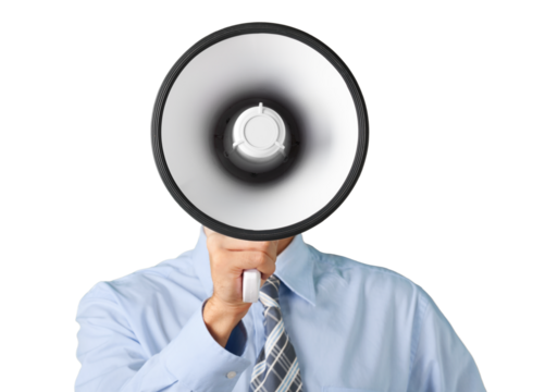 Young businessman talking on the megaphone on white background