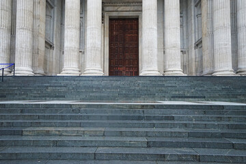 Exterior architecture and design of European building decorated with  wide stair steps