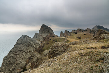 Landscape of Karadag Reserve in spring. View of rocks of ridge Karagach. Crimea