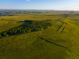 Black Carts Turret aerial view on Hadrian's Wall ruin near village of Chollerford in town of Hexham in England, UK. 