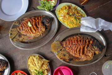 Grilled fish is the main menu at breakfast, lunch and dinner, top view