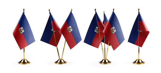 Small national flags of the Haiti on a white background