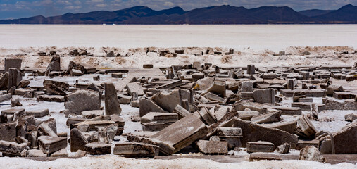 Blocks of salt are cut out of the Salt Flats in Bolivia for use by artists making salt statures.