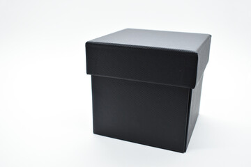 black paper box on white background, packaging industry
