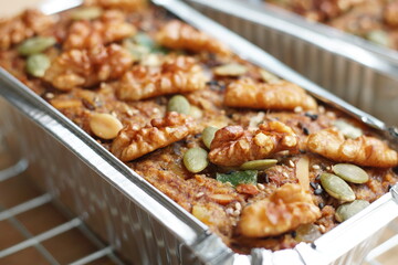 Vegan fruitcake made from whole grains and bananas. No flour and no added sugar. Vegan food for good healthy lover and vegetarian. Selective focus and free space for text.