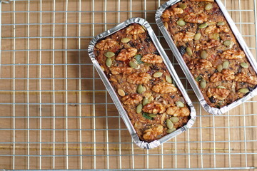 Vegan fruitcake made from whole grains and bananas. No flour and no added sugar. Vegan food for good healthy lover and vegetarian. Selective focus and free space for text.