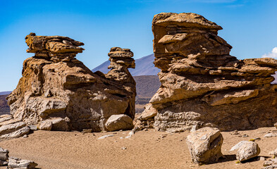 Rock formations in Bolivia at 16,000 feet elevation, carved by constant wind.