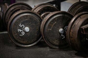 Close up detail shots of weights in an old school bodybuilding gym