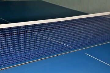 Fototapeta na wymiar Table tennis net on the table close-up