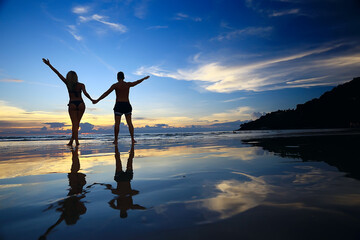 Fototapeta premium young couple on the beach, romantic person summer sea vacation