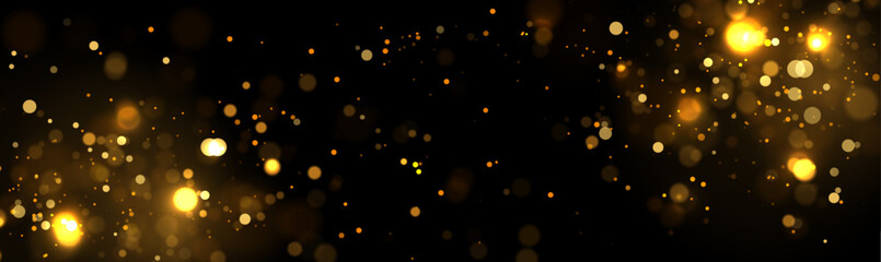 Obraz na płótnie Canvas Golden abstract bokeh on black background. Christmas or holiday card decoration
