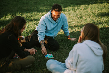 Close up of friends playing ludo