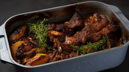 A steak braised herbs, served with boiled  potatoes garnished with fresh oregano.
