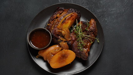 A steak braised herbs, served with boiled  potatoes garnished with fresh oregano.