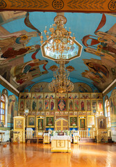 Fototapeta na wymiar SHYMKENT, KAZAKHSTAN - JANUARY 24, 2023: Panorama of the interior of the temple in honor of the icon of the Mother of God of Kazan, Kazakhstan