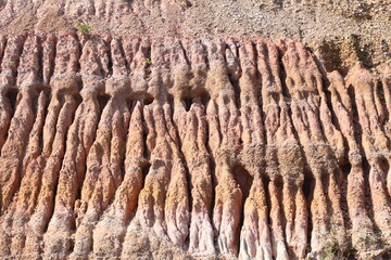Water erodes soil and rocks until beautiful patterns are formed.