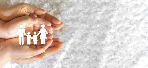 Hand holding family love care and protect, family mental health,  health and house insurance, family life, happy mother father and children, mother day, father day concept