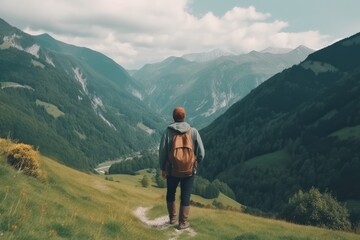 Fototapeta na wymiar Young backpacking man traveler hiker from back view enjoying nature in Alps mountains - Generative AI