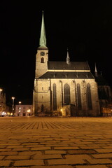 Fototapeta premium St. Bartholomew's Cathedral, a Gothic three-aisled church standing on Republic Square in Pilsen. Church at night