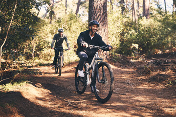 Forest, fitness and friends cyclist on bicycle in nature with helmet, exercise adventure trail and...
