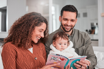 Obraz premium Parents, baby and reading story on sofa with smile, happiness and bonding with love in living room. Man, woman and child with book for learning, care and relax together on lounge couch in family home