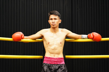 Muay Thai, The martial art of Thailand, Boxer sitting in the corner When the referee stops the...