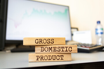 Wooden blocks with words 'GROSS DOMESTIC PRODUCT'. Business concept