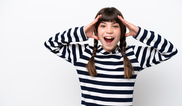 Little caucasian girl isolated on white background with surprise expression