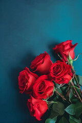 bouquet of red roses on blue background