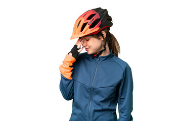 Young cyclist girl over isolated chroma key background laughing