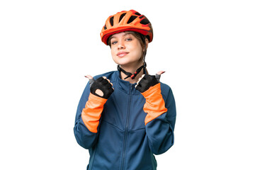 Young cyclist girl over isolated chroma key background with thumbs up gesture and smiling