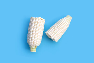 Obraz na płótnie Canvas Hokkaido milk corn on blue background.
