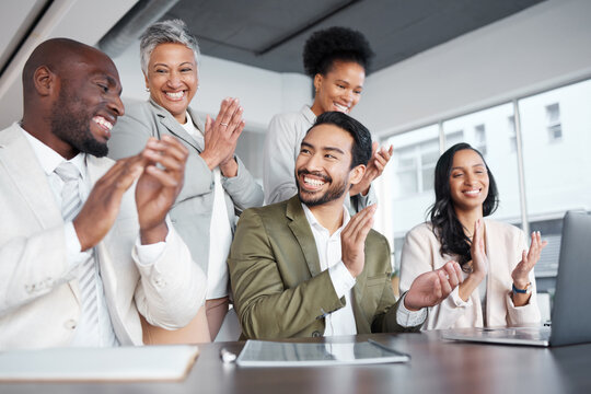 Business people, laptop and clapping hands in meeting for proposal, logo or reveal in office. Team, applause and corporate success by group celebrating achievement, project and job well done together