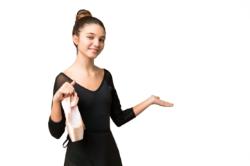 Teenager girl practicing ballet over isolated chroma key background extending hands to the side for inviting to come