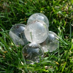 Closeup shot of quartz stones isolated on the background of the grass