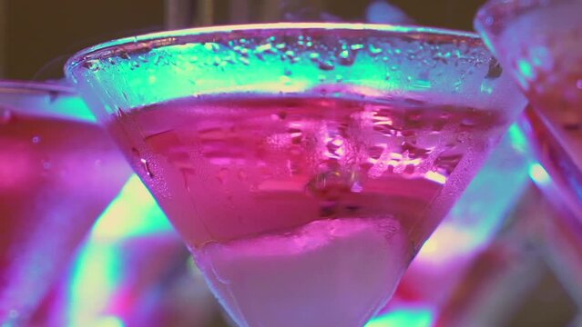 Tower of glasses at celebration party. Welcome drinks, tower of champagne or sparkling wine with red berry. Restaurant ready for reception. Alcoholic beverage.