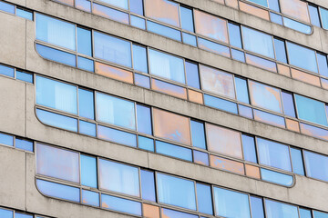 Fototapeta premium Texture of a brutalist architecture glass wall building