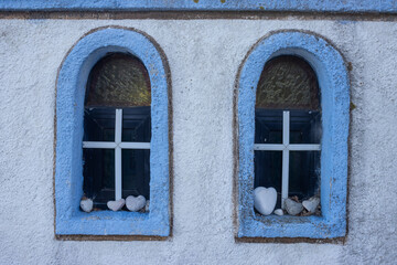 Windows with heart stones, Kinira, Greece