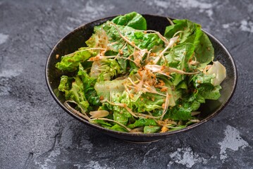 Close-up shot of a salad with lettuce in a bowl