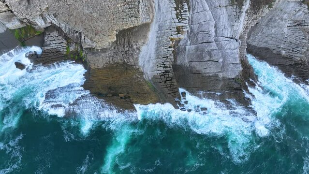 Coastal landscape of cliffs, meadows and sea in the area of Punta Ballota between Tagle and Ubiarco. Aerial view from a drone. Cantabrian Sea. Cantabria, Spain, Europe